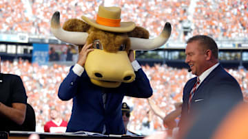 Lee Corso picks Texas to win as Kirk Herbstreit laughs during ESPN's College GameDay show before the Red River Showdown.