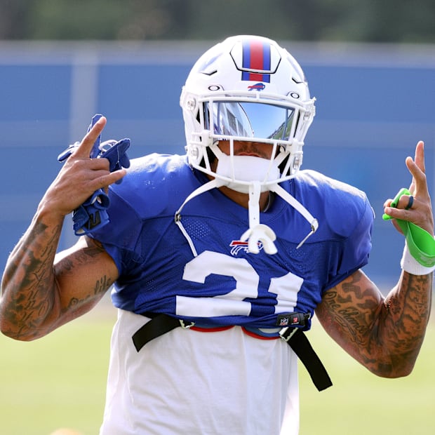 Jordan Poyer shares a laugh at the start of practice