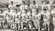 Bill Douglas (11) quarterbacked the Huskies to the 1964 Rose Bowl against Illinois.