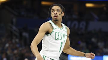 Nov 7, 2025; Orlando, Florida, USA; Boston Celtics forward Josh Minott (8) reacts after  play against the Orlando Magic in the first quarter at Kia Center. Mandatory Credit: Nathan Ray Seebeck-Imagn Images