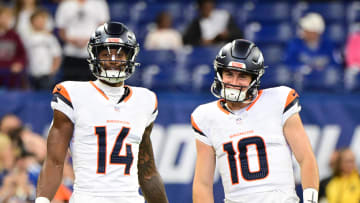 Aug 11, 2024; Indianapolis, Indiana, USA; Denver Broncos wide receiver Courtland Sutton (14) and quarterback Bo Nix (10) stand on the field during warm ups before the game against the Indianapolis Colts at Lucas Oil Stadium. Mandatory Credit: Marc Lebryk-USA TODAY Sports