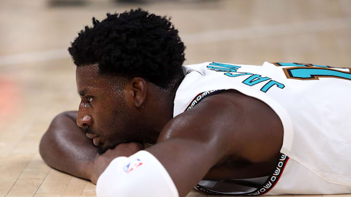 Oct 26, 2024; Memphis, Tennessee, USA; Memphis Grizzlies forward Jaren Jackson Jr. (13) lays on the court after being fouled during the second half against the Orlando Magic at FedExForum. Mandatory Credit: Petre Thomas-Imagn Images