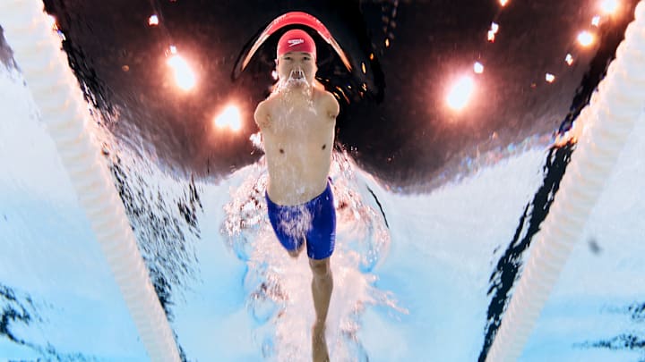 NANTERRE, FRANCE - AUGUST 30: (EDITORS NOTE: Image was captured using an underwater robotic camera.) Lead swimmer Lichao Wang of Team People's Republic of China competes in the Mixed 4x50m Freestyle Relay 20 Points heat race on day two of the Paris 2024 Summer Paralympic Games at Paris La Defense Arena on August 30, 2024 in Nanterre, France.