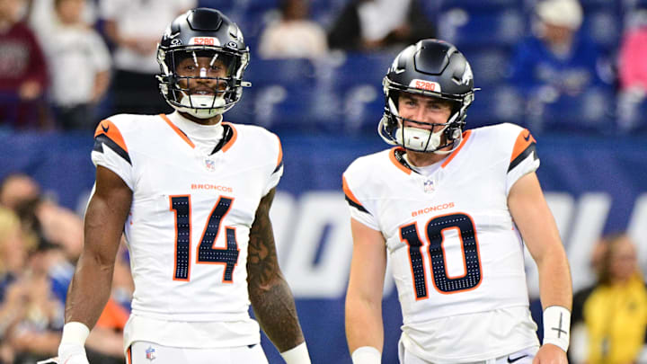 Aug 11, 2024; Indianapolis, Indiana, USA; Denver Broncos wide receiver Courtland Sutton (14) and quarterback Bo Nix (10) stand on the field during warm ups before the game against the Indianapolis Colts at Lucas Oil Stadium. Mandatory Credit: Marc Lebryk-Imagn Images