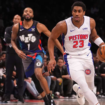 Apr 6, 2024; Brooklyn, New York, USA;  Detroit Pistons point guard Jaden Ivey (23) dribbles the ball down the lane against the Brooklyn Nets during the first half at Barclays Center. Mandatory Credit: Gregory Fisher-USA TODAY Sports