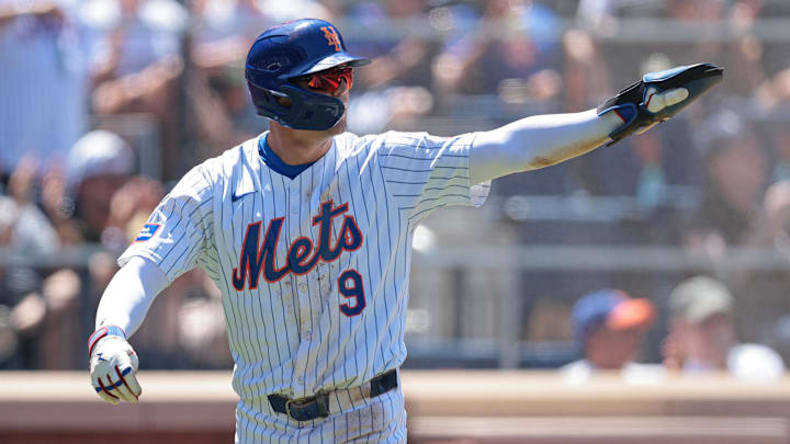 Jul 11, 2024; New York City, New York, USA; New York Mets left fielder Brandon Nimmo (9) celebrates after scoring a run during the fifth inning against the Washington Nationals at Citi Field. Mandatory Credit: Vincent Carchietta-Imagn Images