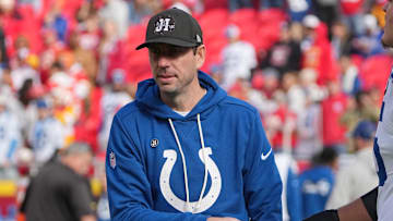 Nov 23, 2025; Kansas City, Missouri, USA; Indianapolis Colts head coach Shane Steichen reacts with offensive tackle Jalen Travis (75) during warm ups before the game against the Kansas City Chiefs at GEHA Field at Arrowhead Stadium. 