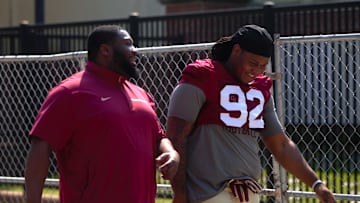 FSU football players walk into the first spring practice of the spring season on Wednesday, March 19, 2025