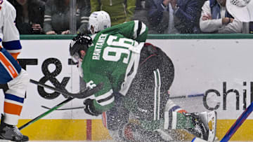 Nov 18, 2025; Dallas, Texas, USA; Dallas Stars right wing Mikko Rantanen (96) is called for a game misconduct penalty for boarding on New York Islanders defenseman Alexander Romanov (28) during the third period at the American Airlines Center. Mandatory Credit: Jerome Miron-Imagn Images