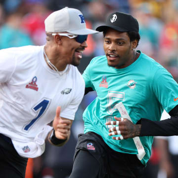 Feb 4, 2024; Orlando, FL, USA; AFC cornerback Jalen Ramsey (5) of the Miami Dolphins pressures NFC quarterback Jalen Hurts (1) during the 2024 Pro Bowl at Camping World Stadium. Mandatory Credit: Nathan Ray Seebeck-USA TODAY Sports
