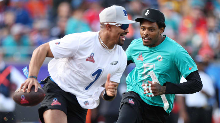 Feb 4, 2024; Orlando, FL, USA; AFC cornerback Jalen Ramsey (5) of the Miami Dolphins pressures NFC quarterback Jalen Hurts (1) during the 2024 Pro Bowl at Camping World Stadium. Mandatory Credit: Nathan Ray Seebeck-USA TODAY Sports