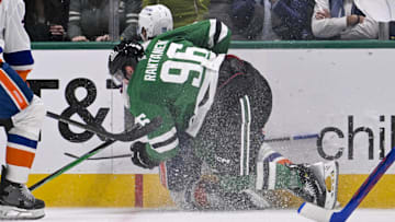Nov 18, 2025; Dallas, Texas, USA; Dallas Stars right wing Mikko Rantanen (96) is called for a game misconduct penalty for boarding on New York Islanders defenseman Alexander Romanov (28) during the third period at the American Airlines Center. Mandatory Credit: Jerome Miron-Imagn Images