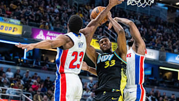 Nov 24, 2023; Indianapolis, Indiana, USA; Indiana Pacers center Myles Turner (33) shoots the ball while Detroit Pistons guard Jaden Ivey (23) and center Isaiah Stewart (28): Trevor Ruszkowski-Imagn Images