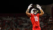 Sep 7, 2024; Tucson, Arizona, USA; Arizona Wildcats defensive back Gavin Hunter (10) hypes up crowd after  kickoff against Northern Arizona Lumberjacks during fourth quarter at Arizona Stadium. 