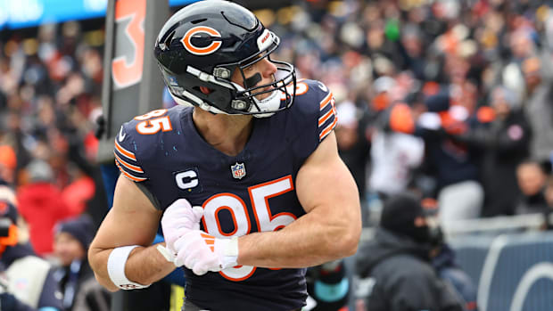Cole Kmet had to long snap last year besides chasing down passes and celebrating touchdowns.