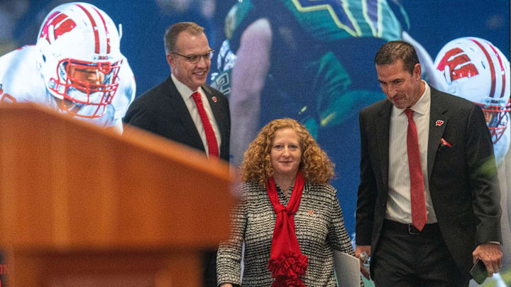 New Wisconsin head football coach Luke Fickell, right, joins  athletic director Chris McIntosh, left, and Chancellor Jennifer Mnookin at a welcome event Monday, November 28, 2022. at Camp Randall Stadium in Madison, Wis. He was previously head coach for six seasons at Cincinnati.MARK HOFFMAN/MILWAUKEE JOURNAL SENTINEL

Mjs Uwgrid28 4 Jpg Uwgrid Fickell