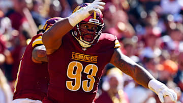 Oct 6, 2024; Landover, Maryland, USA; Washington Commanders defensive tackle Jonathan Allen (93) celebrates after a tackle during the second quarter against the Cleveland Browns at NorthWest Stadium. Mandatory Credit: Peter Casey-Imagn Images