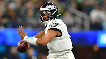 Dec 8, 2025; Inglewood, California, USA; Philadelphia Eagles quarterback Jalen Hurts (1) passes against the Los Angeles Chargers in the second half at SoFi Stadium. Mandatory Credit: Gary A. Vasquez-Imagn Images