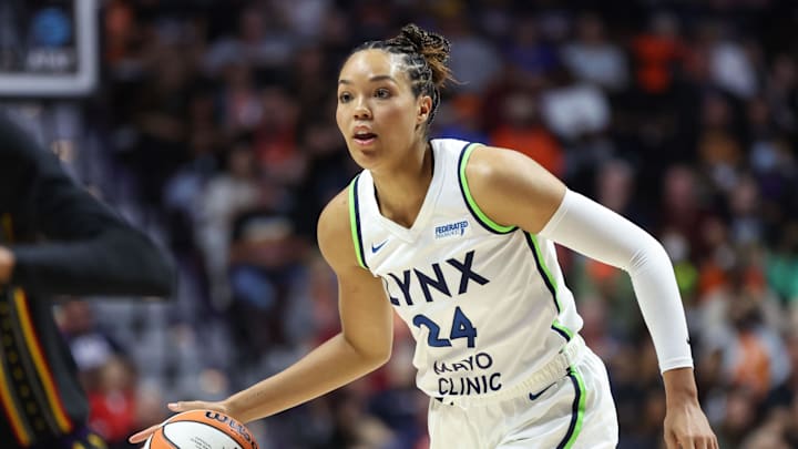 Oct 4, 2024; Uncasville, Connecticut, USA; Minnesota Lynx forward Napheesa Collier (24) dribbles the ball during the first half against the Connecticut Sun during game three of the 2024 WNBA Semi-finals at Mohegan Sun Arena. Mandatory Credit: Paul Rutherford-Imagn Images