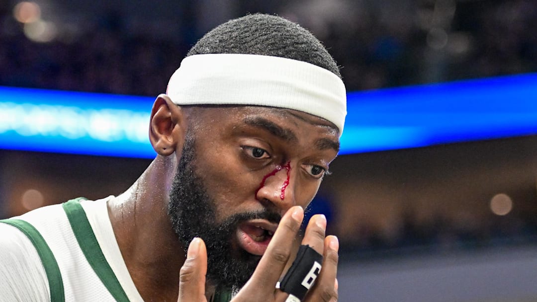 Milwaukee Bucks forward Bobby Portis reacts after getting a cut on his nose after a foul in the fourth quarter against the Utah Jazz at Fiserv Forum on November 7, 2024.