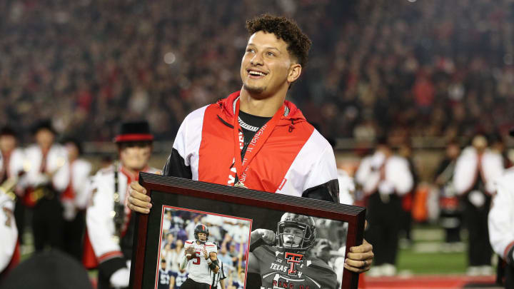 Oct 29, 2022; Lubbock, Texas, USA;  Kansas City Chiefs quarterback Patrick Mahomes II watches as his name is unveiled during his induction in the Ring of Honor at halftime of a game between the Texas Tech Red Raiders and the Baylor Bears at Jones AT&T Stadium and Cody Campbell Field. Mandatory Credit: Michael C. Johnson-USA TODAY Sports