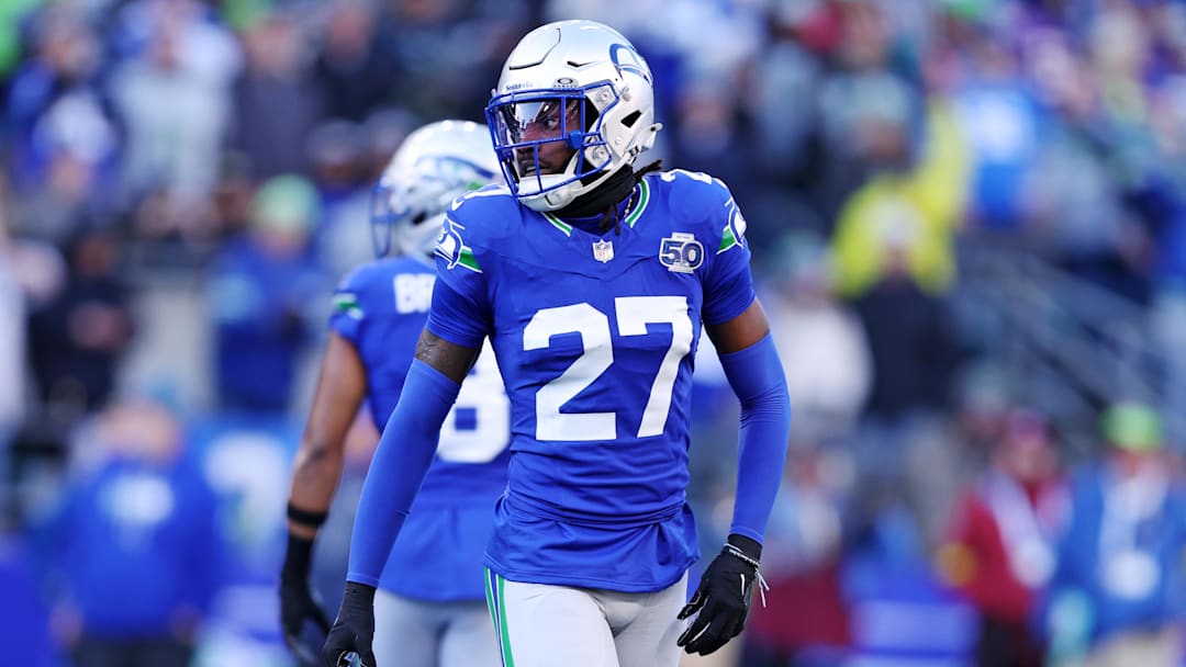 Nov 30, 2025; Seattle, Washington, USA; Seattle Seahawks cornerback Riq Woolen (27) reacts after a play during the second half against the Minnesota Vikings at Lumen Field.