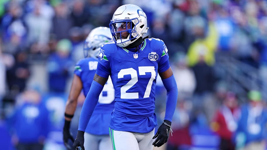 Seattle Seahawks cornerback Riq Woolen (27) reacts after a play.