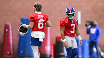 Jun 17, 2025; East Rutherford, NJ, USA; New York Giants quarterback Jaxson Dart (6) and quarterback Russell Wilson (3) interact during minicamp at Quest Diagnostics Training Center. Mandatory Credit: John Jones-Imagn Images