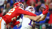 Jan 26, 2025; Kansas City, MO, USA; Buffalo Bills wide receiver Mack Hollins (13) makes a touchdown catch against Kansas City Chiefs cornerback Trent McDuffie (22) during the first half in the AFC Championship game at GEHA Field at Arrowhead Stadium. Mandatory Credit: Mark J. Rebilas-Imagn Images