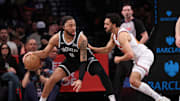 Apr 13, 2025; Brooklyn, New York, USA; Brooklyn Nets forward Trendon Watford (9) is guarded by New York Knicks guard Landry Shamet (44) during the first half at Barclays Center. Mandatory Credit: Vincent Carchietta-Imagn Images