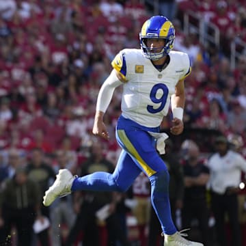 Nov 9, 2025; Santa Clara, California, USA; Los Angeles Rams running back Kyren Williams (23) runs for a touchdown as Los Angeles Rams quarterback Matthew Stafford (9) watches during the first quarter against the San Francisco 49ers at Levi's Stadium. Mandatory Credit: Kyle Terada-Imagn Images