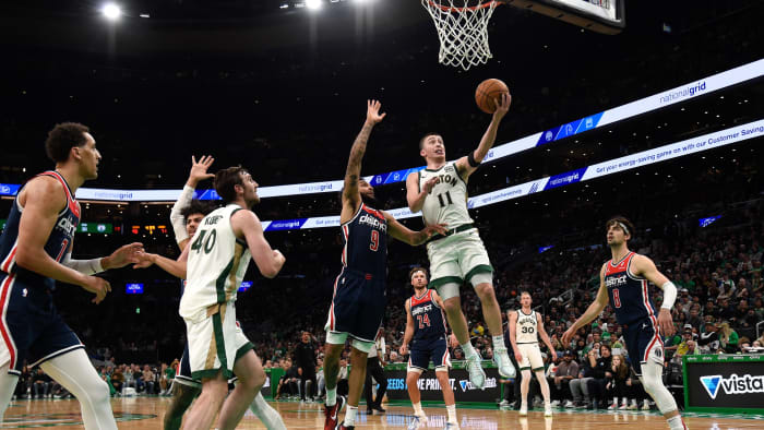 Apr 14, 2024; Boston, Massachusetts, USA;  Boston Celtics guard Payton Pritchard (11) drives to the basket.