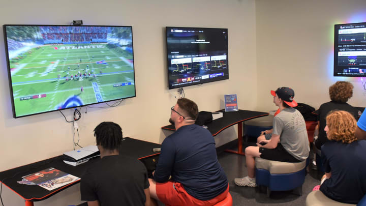 Florida Atlantic University's Andre Lamas plays alongside teammates and friends during FAU's launch party for EA Sports College Football 25 (July 17, 2024).