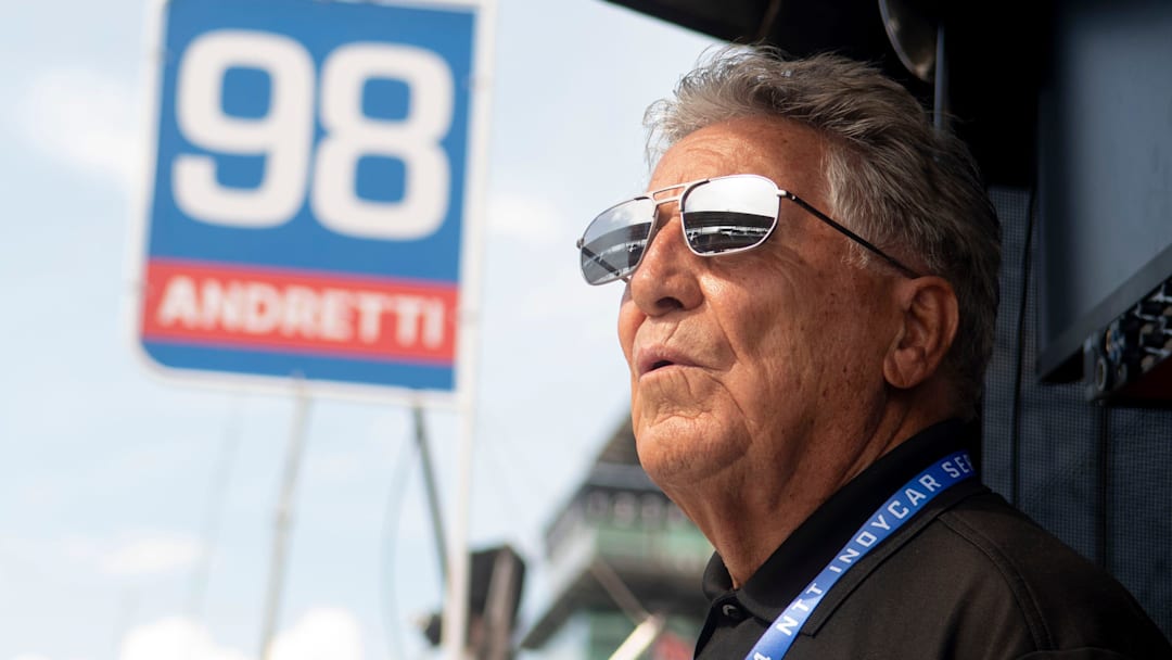 Mario Andretti looks out on the track Friday, May 17, 2024, during Fast Friday ahead of the 108th running of the Indianapolis 500 at Indianapolis Motor Speedway.