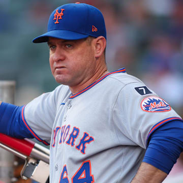 Jun 19, 2025; Atlanta, Georgia, USA; New York Mets manager Carlos Mendoza (64) in the dugout before a game against the Atlanta Braves at Truist Park. Mandatory Credit: Brett Davis-Imagn Images