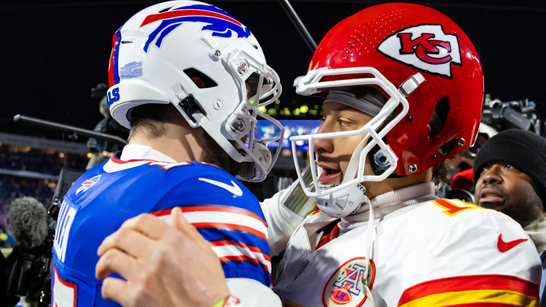 Jan 21, 2024; Orchard Park, New York, USA; Kansas City Chiefs quarterback Patrick Mahomes (15) greets Buffalo Bills quarterback Josh Allen (17) following the 2024 AFC divisional round game at Highmark Stadium.