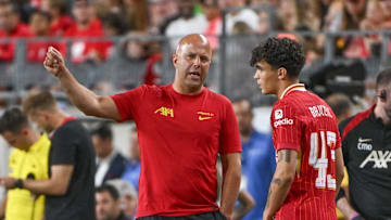 Jul 26, 2024; Pittsburgh, PA, USA; Liverpool manager Arne Slot talks with Liverpool midfielder Stefan Bajcetic (43) during the second half at Acrisure Stadium. Mandatory Credit: Barry Reeger-Imagn Images