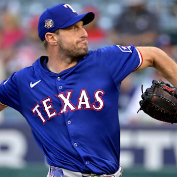 Jul 9, 2024; Anaheim, California, USA;  Texas Rangers starting pitcher Max Scherzer (31) delivers to the plate in the first inning against the Los Angeles Angels at Angel Stadium. 