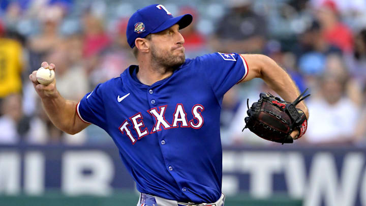 Jul 9, 2024; Anaheim, California, USA;  Texas Rangers starting pitcher Max Scherzer (31) delivers to the plate in the first inning against the Los Angeles Angels at Angel Stadium. 