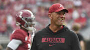Aug 31, 2024; Tuscaloosa, Alabama, USA;  Alabama Crimson Tide head coach Kalen DeBoer watches his team warm up before a game against the Western Kentucky Hilltoppers at Bryant-Denny Stadium. The game will be the first with DeBoer as head coach of the Crimson Tide. Mandatory Credit: Gary Cosby Jr.-Imagn Images