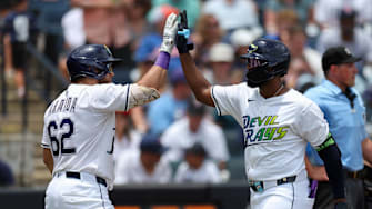 Tampa Bay Rays third baseman Junior Caminero (13) celebrates with first baseman Jonathan Aranda (62) after hitting a home run against the Detroit Tigers in the fourth inning at George M. Steinbrenner Field. Nathan Ray Seebeck-Imagn Images