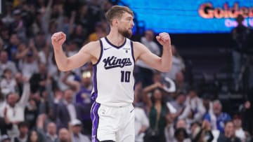 Apr 16, 2024; Sacramento, California, USA; Sacramento Kings forward Domantas Sabonis (10) reacts after the Kings made a basket against the Golden State Warriors in the first quarter during a play-in game of the 2024 NBA playoffs at the Golden 1 Center. Mandatory Credit: Cary Edmondson-USA TODAY Sports