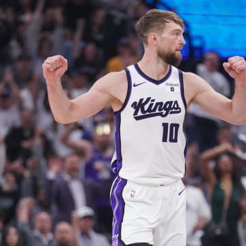 Apr 16, 2024; Sacramento, California, USA; Sacramento Kings forward Domantas Sabonis (10) reacts after the Kings made a basket against the Golden State Warriors in the first quarter during a play-in game of the 2024 NBA playoffs at the Golden 1 Center. Mandatory Credit: Cary Edmondson-USA TODAY Sports