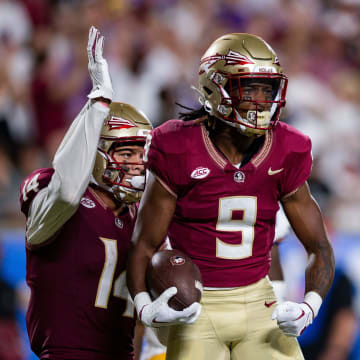 Sep 5, 2023; Orlando, Florida, USA; Florida State Seminoles running back Lawrance Toafili (9) celebrates a first down during a game against the LSU Tigers at Camping World Stadium on Sunday, Sept. 3, 2023. Mandatory Credit: Alicia Devine-USA TODAY Sports