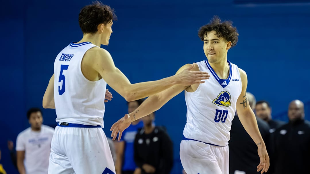 Delaware Hens guard Christian Bliss (00) celebrates with forward Macon Emory (5) celebrates during the NCAA college basketball game against Middle Tennessee on Saturday, Feb. 7, 2026, at The Bob Carpenter Sports Convocation Center in Newark, Delaware.Delaware Hens guard Christian Bliss (00) celebrates with forward Macon Emory (5) during the NCAA college basketball game against Middle Tennessee on Feb. 7, 2026, at The Bob Carpenter Center in Newark. Delaware Hens guard Christian Bliss (00) celebrates with forward Macon Emory (5) celebrates during the NCAA college basketball game against Middle Tennessee on Saturday, Feb. 7, 2026, at The Bob Carpenter Sports Convocation Center in Newark, Delaware.Delaware Hens guard Christian Bliss (00) celebrates with forward Macon Emory (5) during the NCAA college basketball game against Middle Tennessee on Feb. 7, 2026, at The Bob Carpenter Center in Newark.
