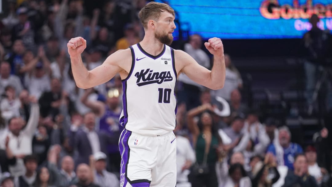 Apr 16, 2024; Sacramento, California, USA; Sacramento Kings forward Domantas Sabonis (10) reacts after the Kings made a basket against the Golden State Warriors in the first quarter during a play-in game of the 2024 NBA playoffs at the Golden 1 Center. Mandatory Credit: Cary Edmondson-USA TODAY Sports