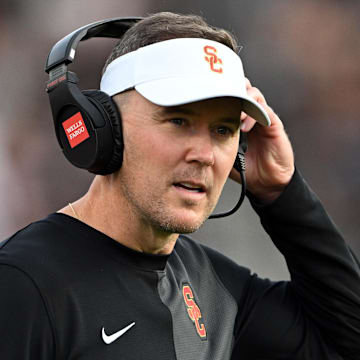 Sep 13, 2025; West Lafayette, Indiana, USA; Southern California Trojans head coach Lincoln Riley stands on the sidelines during the first quarter against the Purdue Boilermakers at Ross-Ade Stadium. Mandatory Credit: Marc Lebryk-Imagn Images