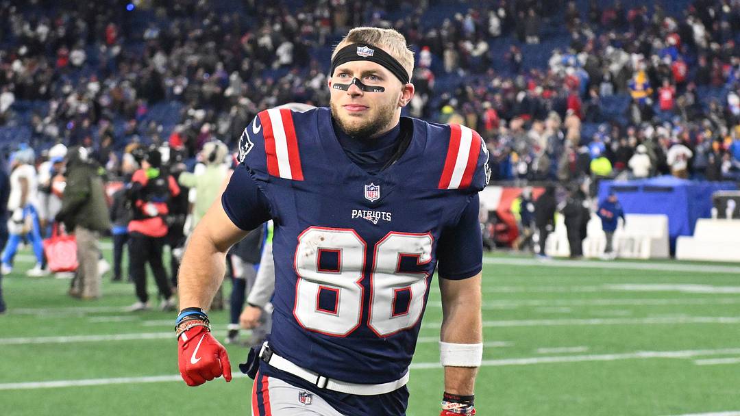 Jan 11, 2026; Foxborough, MA, USA; New England Patriots wide receiver Efton Chism III (86) jogs off the field after defeating the Los Angeles Chargers in an AFC Wild Card Round game at Gillette Stadium. Mandatory Credit: Eric Canha-Imagn Images