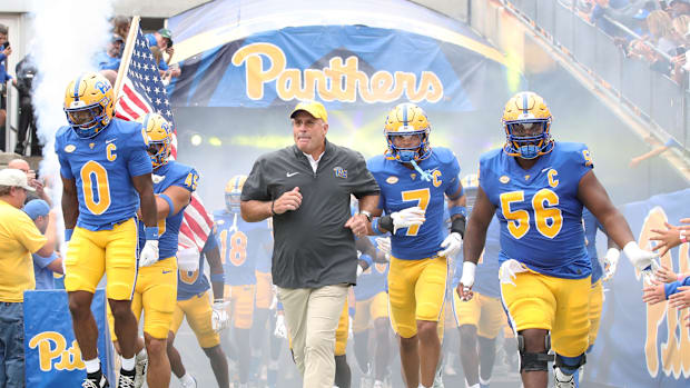 Pittsburgh Panthers running back Desmond Reid (0), head coach Pat Narduzzi