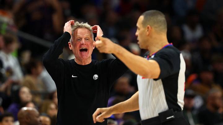 Phoenix, Arizona, USA; Golden State Warriors head coach Steve Kerr reacts against the Phoenix Suns in the second half at Mortgage Matchup Center. Mandatory Credit: Mark J. Rebilas-Imagn Images, top
